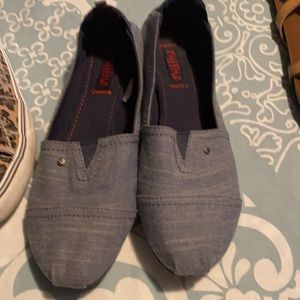 Grey slip on shoes